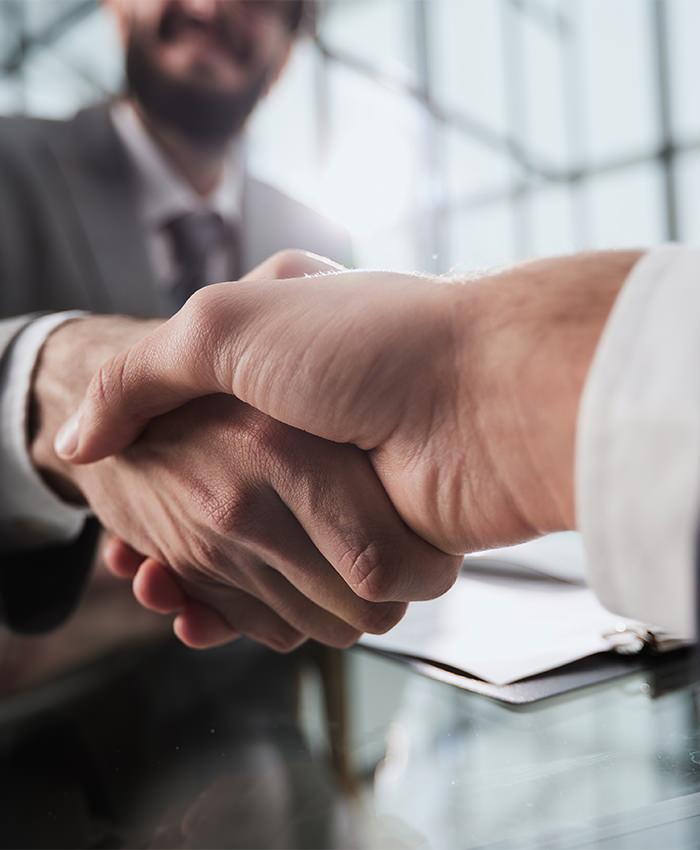 Two men are shaking hands