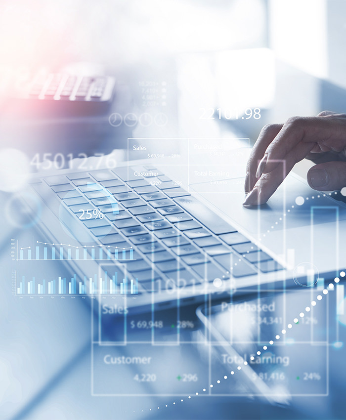 A woman is using a laptop