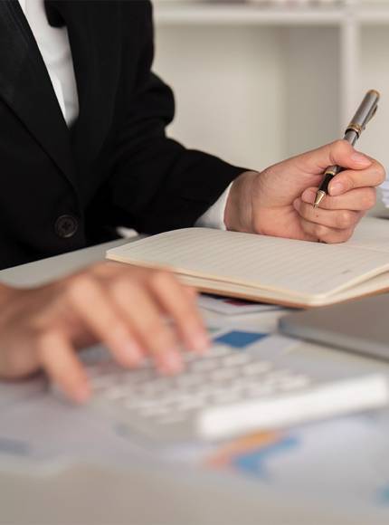 A man is making calculations