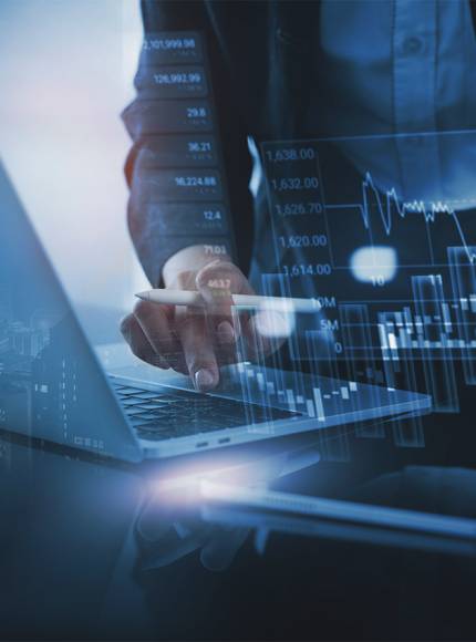 A woman is using a laptop