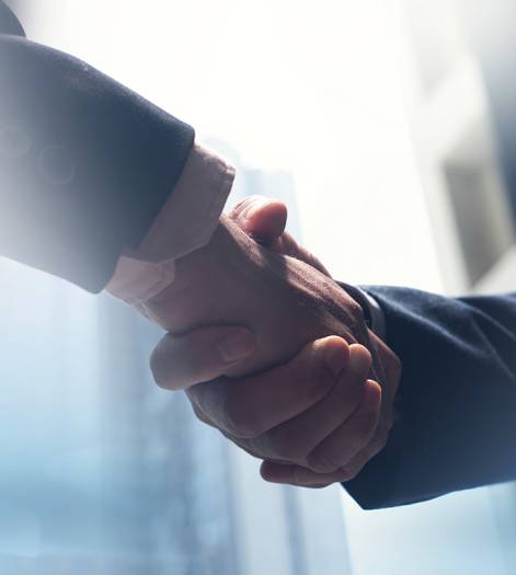 Two men are shaking hands